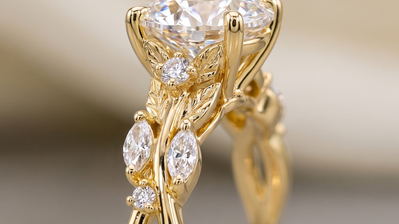 Close up of a diamond solitaire on a gold vine band