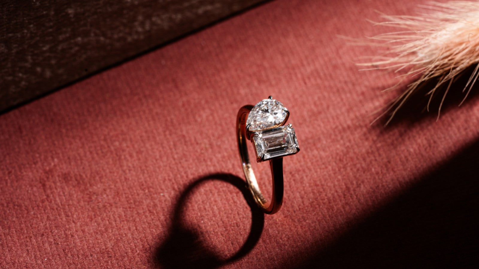 Toi et moi ring with a pear and an emerald cut lab grown diamond side by side