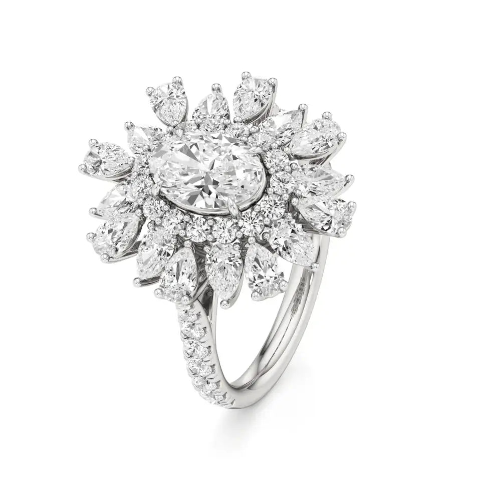 Flora | Oval-cut Solitaire with Pear & Round Side Stones - Nivara