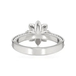 Flora | Round Solitaire with Halo Ring in Floral Design - Nivara